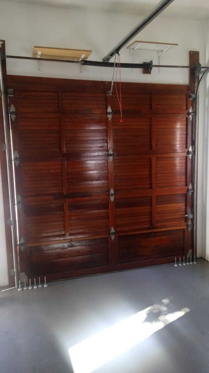 ACT Garage Door Repairs technician on a job